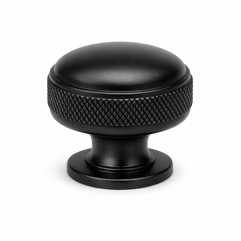 Commercial product photograph. A single residential cabinet knob. Knurled surface texture. Round Kno