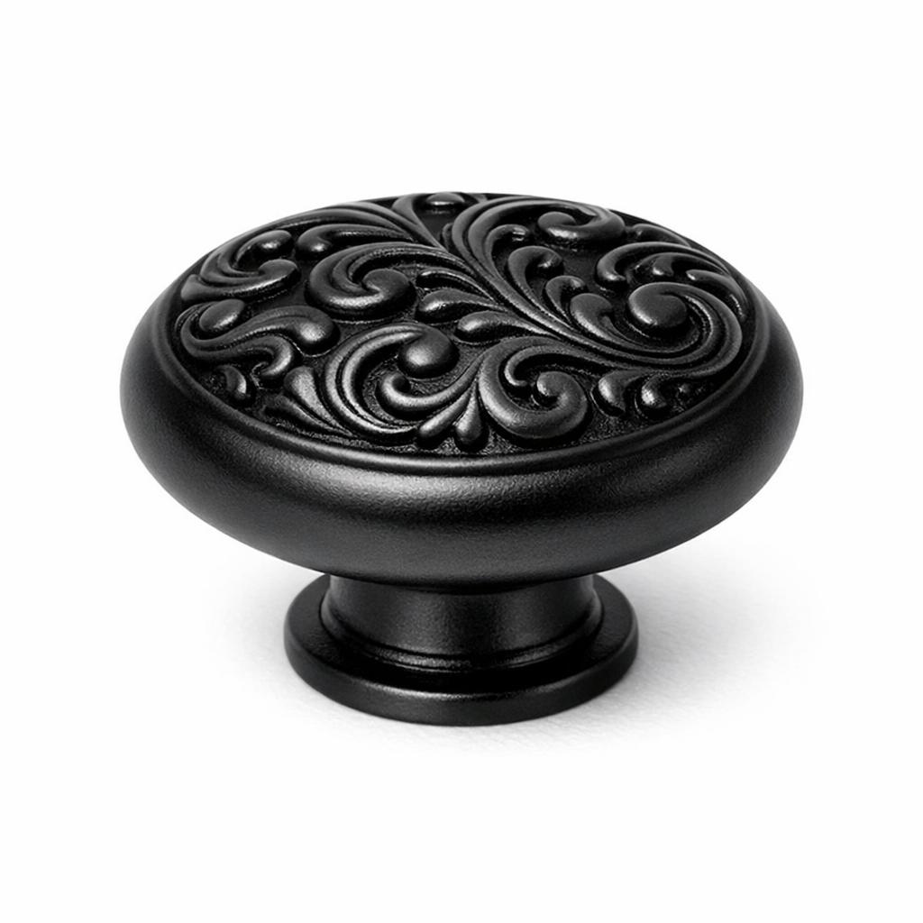 Commercial product photograph. A single residential cabinet knob. Scrollwork surface texture. Round Knob sh...